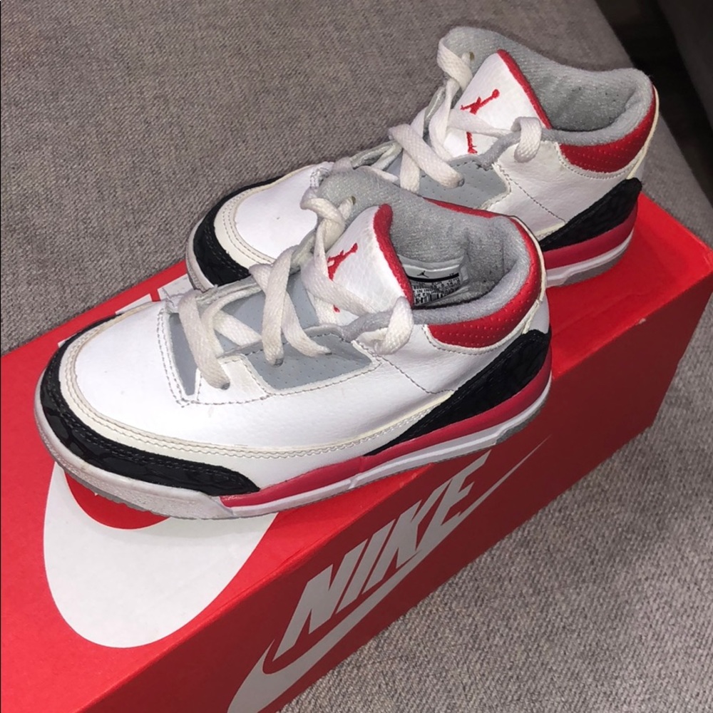 Red black and white Jordans